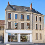 A vendre, Immeuble comprenant 5 appartements et 1 commerce.
